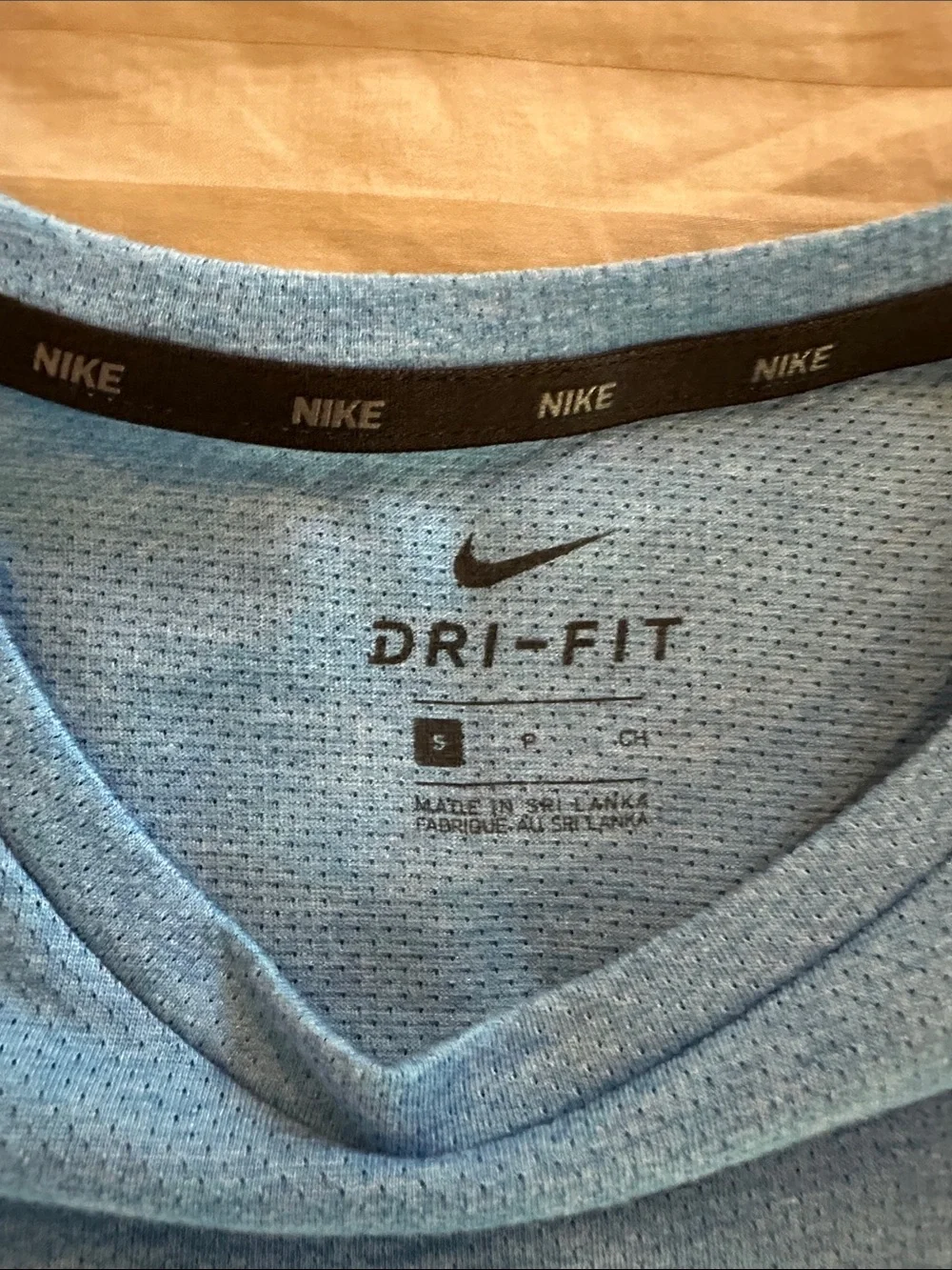 Nike Light Blue Athletic Tee with Navy Swoosh